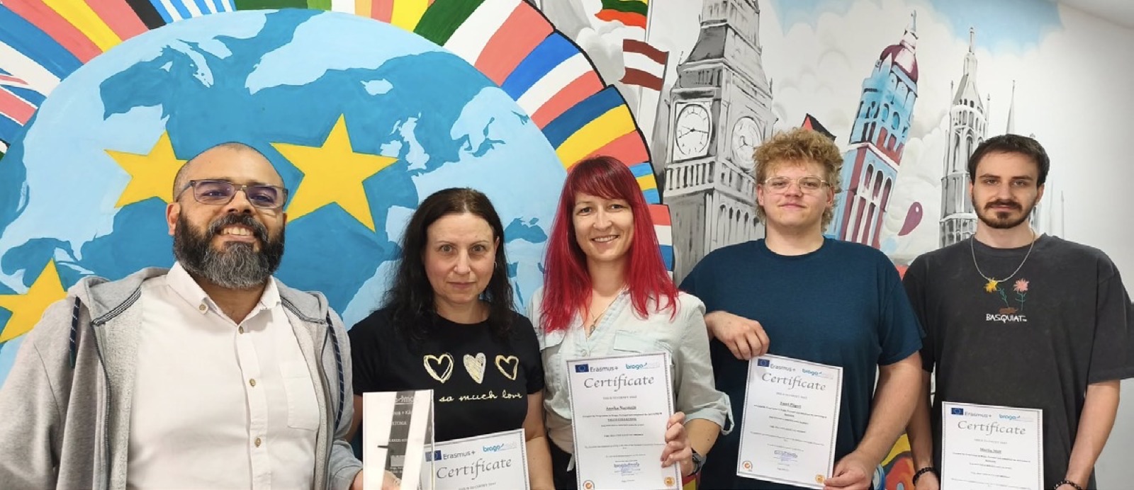 Teachers with their course certificates