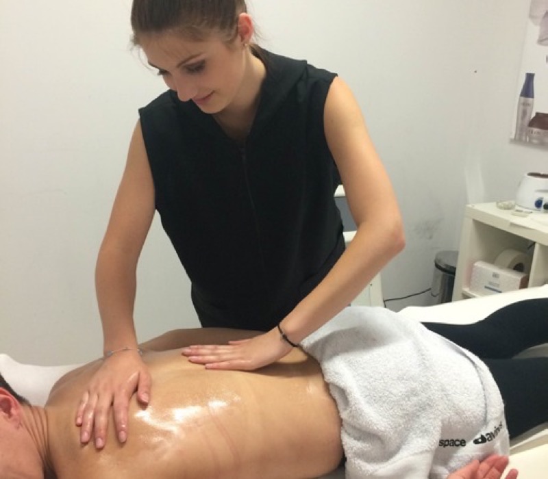 Physiotherapy trainee working with a tutor