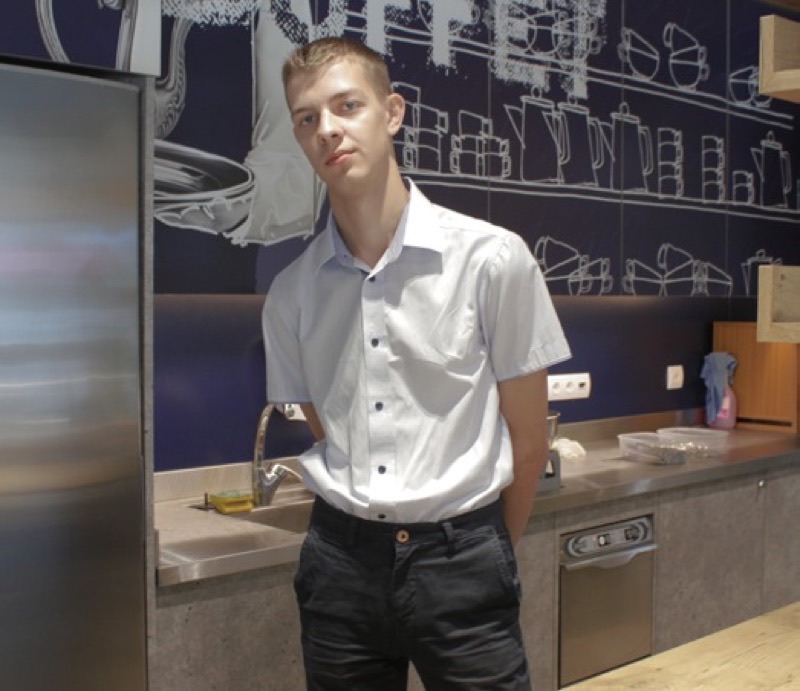 Hospitality trainee serving in a restaurant