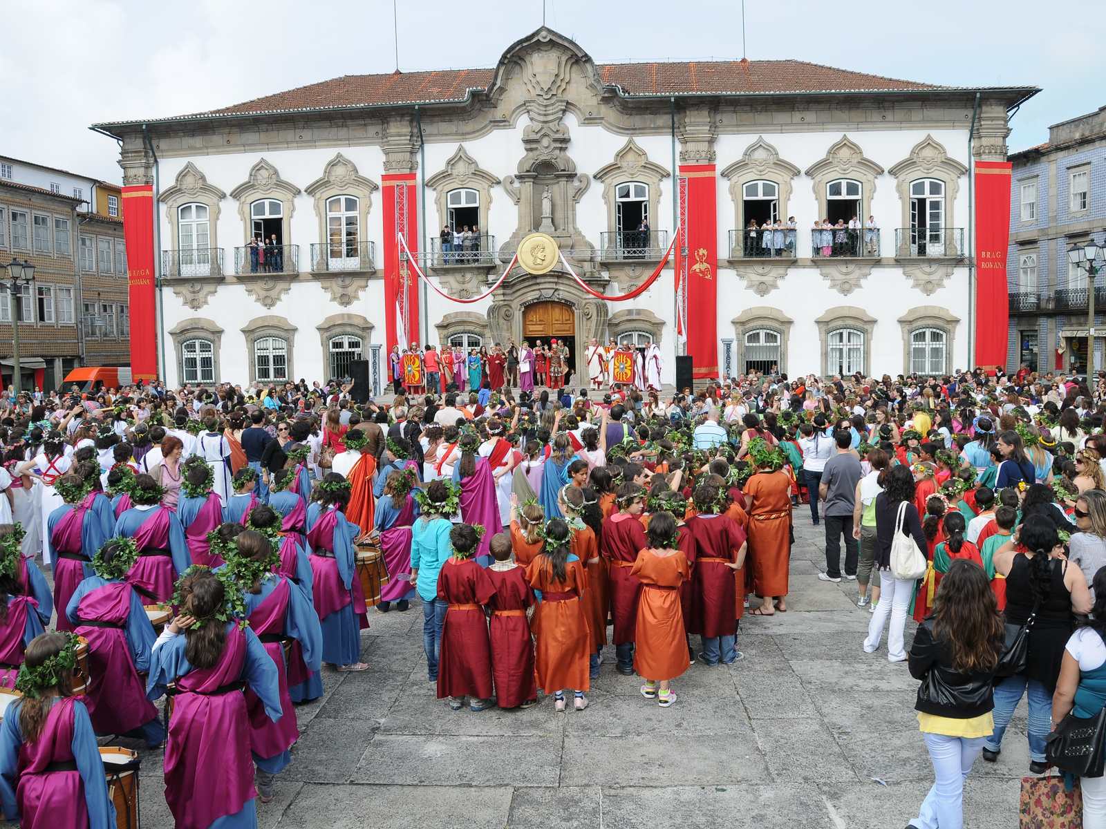Braga Romana festival with people in costume in front of the town hall