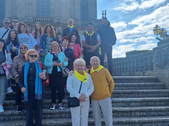 Group on the steps in front of a sanctuary